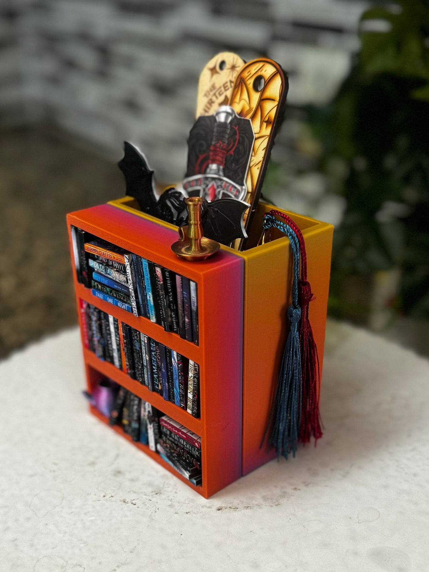 Mini shelf book mark holder