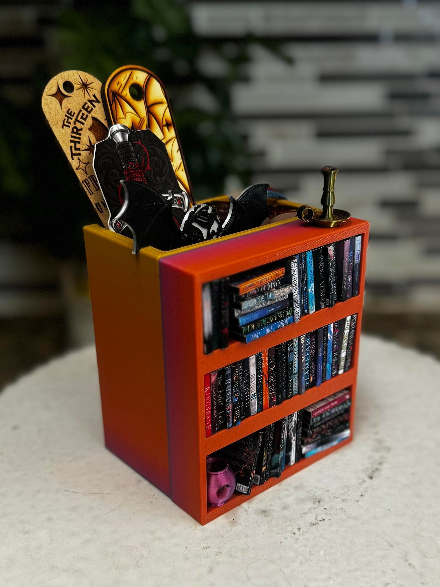 Mini shelf book mark holder