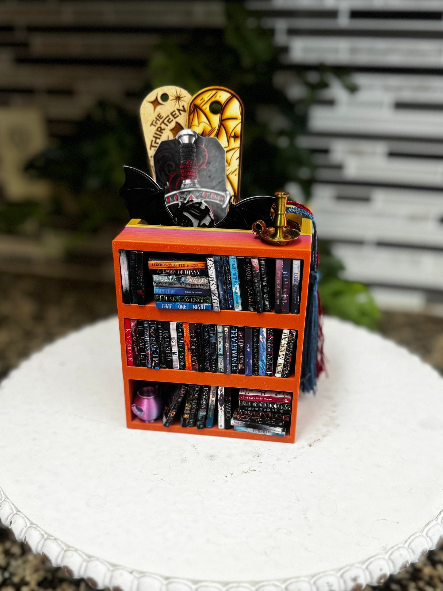 Mini shelf book mark holder